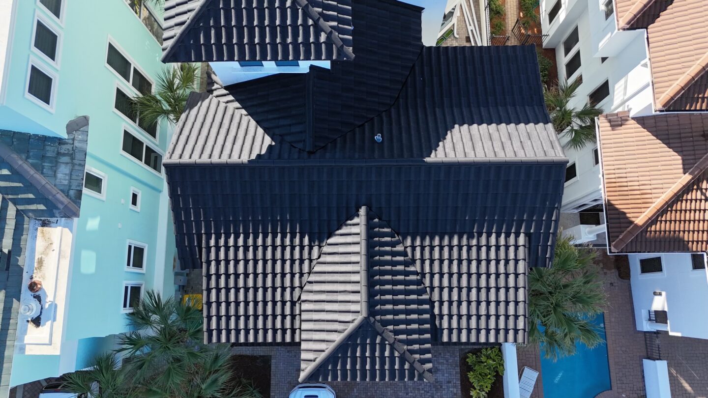 Overhead view of a TEK metal tile roof on a coastal home